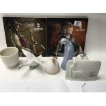 6 Lladro porcelain Items and 2 Lladro books.