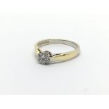 An 18carat gold ring set with a brilliant cut diam