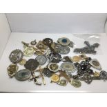 A collection of approx 40 religious pendants and c