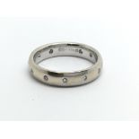 An 18ct white gold eternity diamond ring, approx 4