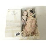 Two Early 20th century bisque dolls one in traditi