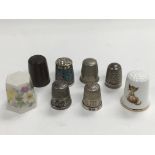 Two Charles Horner silver thimbles plus others.