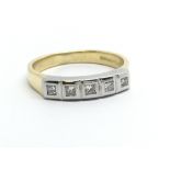 An 18ct gold diamond ring set with five princess c