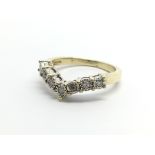 A 9carat gold ring of wishbone shape set with diam