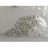 A bag of loose mixed round cut diamonds, approx 5.