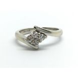 A 9ct white gold four stone diamond ring, approx .
