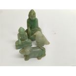 A collection of four jade figures in the form of Buddha, a bird and a dog of Fo . 7 cm down.