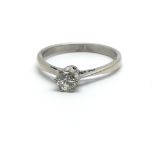 An 18ct white gold and diamond solitaire ring, approx 0.20ct, ring size approx N/O