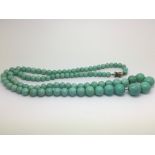 A French Art Deco pate de verre bead necklace.