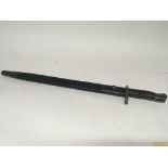 An American Remington I world war bayonet with leather and steel scabbard.
