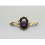 A Victorian 9ct gold and amethyst brooch, approx 10.8g.