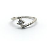 An 18ct white gold princess cut diamond, approx 0.16ct, ring size approx K