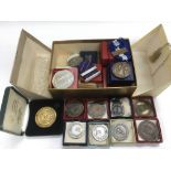 A collection of Bisley shooting medals.
