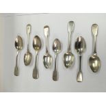 Eight Georgian silver teaspoons, different assays, all monogrammed, approx 150g.