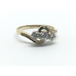 An 18ct yellow gold and CZ ring, ring size approx L/M