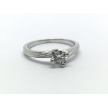 A platinum and diamond solitaire ring, approx 0.25ct, size approx H