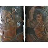 A pair of Japanese bamboo brush pots with carved samurai decoration. 36.5cm