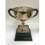 A silver trophy cup on stand, Chester 1929, with inscription, total height 22cm and approx weight