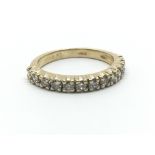 An 18ct yellow gold half eternity diamond ring, approx 0.52ct, ring size approx I/J