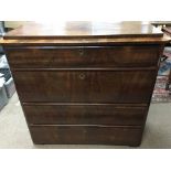 A 19th century German Biedermeier Mahogany chest of drawers with four cushion drawer the top with