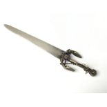 An interesting silver plate paper knife with anchor handle and inset with enamel badge ‘Souvenir