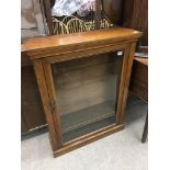 A Victorian mahogany glazed pier cabinet. 105 x 83.5cm.