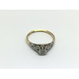 An 18ct gold ring set with chip diamonds, approx 2.2g and approx size L- M.