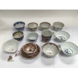 A box of Oriental tea bowls and cups, some damages.