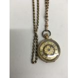 A 18 ct gold button wind pocket watch with 9 ct gold chain 33 grams approx.