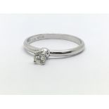 An 18ct white gold and diamond solitaire ring, approx 0.20ct, ring size approx O/P