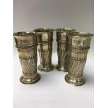 A set of four silver trumpet shape vase 15 cm Lond