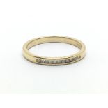 An 18ct yellow gold half eternity ring with a row of small diamonds, ring size approx N/O