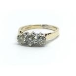 An 18ct yellow gold and three stone diamond ring, approx 0.5ct, ring size approx G/H