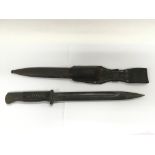 A WW2 German bayonet and sheath by Ernst Pack & Sohn.