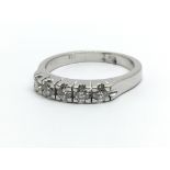 An 18ct white gold five stone diamond ring, approx 0.60ct, ring size approx O