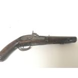 A 19th century percussion pistol with a walnut stock and steel fittings.