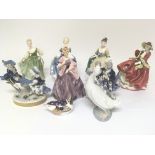 A collection of Royal Doulton figures a Royal crown Derby bird and two Continental blue and white