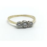 An 18ct yellow gold and three stone diamond ring, approx 0.25ct, ring size approx Q