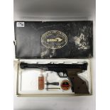 A vintage boxed Gamo precision air pistol.