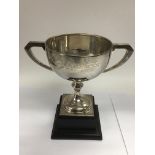 A silver trophy cup on stand, Sheffield hallmarks, approx total height 17cm and approx weight