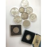 10 fine silver coins including 5 fine silver one dollar coins.
