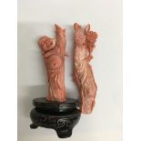 Two Chinese coral Figures 10 cm 13 cm .