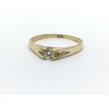 An 18ct yellow gold ring with single solitaire diamond, approx 0.20ct, ring size approx O/P