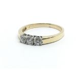 A 9ct yellow gold and three stone diamond ring, approx 0.25ct, ring size approx N/O