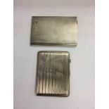 Two silver cigarette cases, different assays.