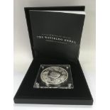 A cased Waterloo 200 year anniversary commemorative coin made of bronze and layered in silver.