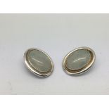 A pair of vintage silver and jade earrings marked 950.