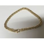 An 18carat gold Italian woven link bracelet Weight 9g