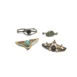 Four Art Nouveau brooches including a Charles Horner example.