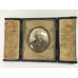 A Victorian miniature cased portrait of a well dre